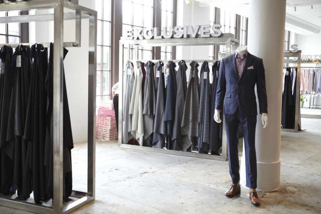 Custom menswear showroom setup inside Indochino New York pop-up