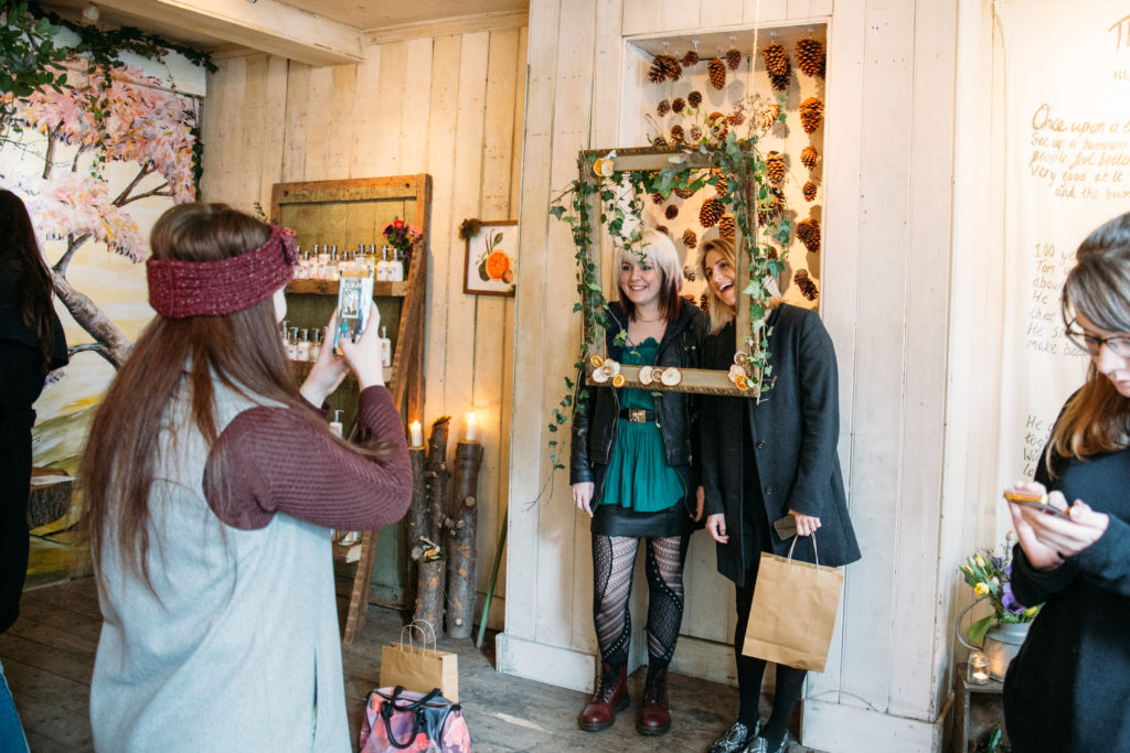 Shopper receiving personalised product consultation in Soho pop-up shop