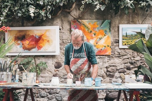 An artist at work during Art Basel Miami, the kind of live activation brands stage at the fair