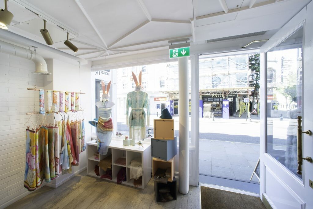 The showroom was designed as a colorful and romantic boutique