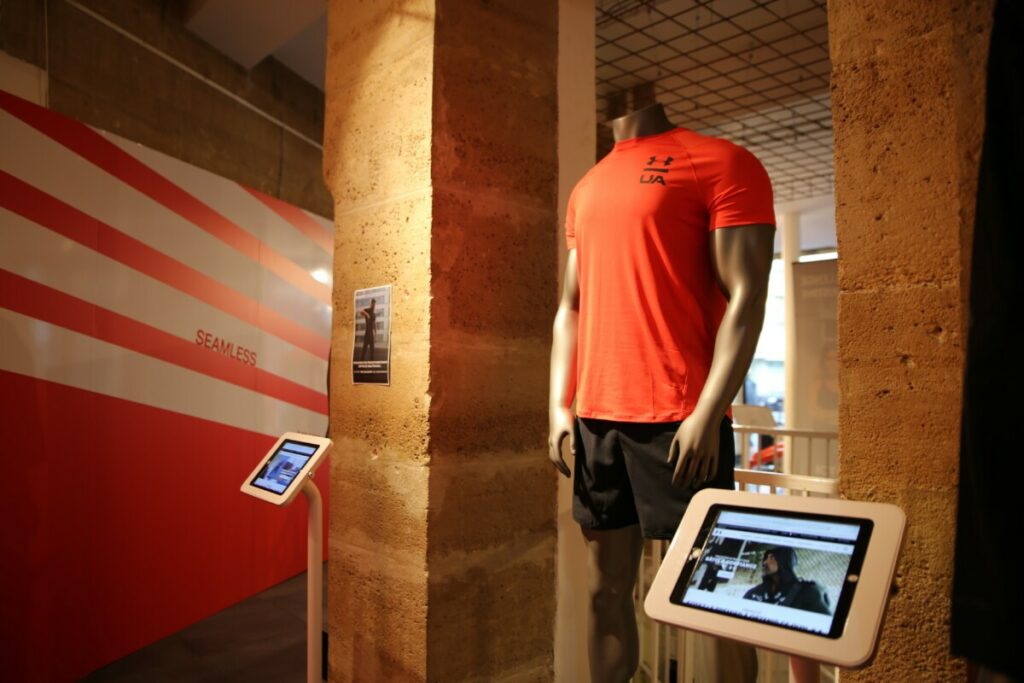 Under Armour experiential pop-up technology displaying products through interactive digital installation